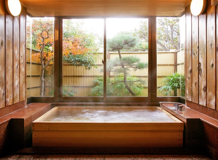 Japanese soaking tub with view of garden