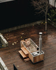 wood-burning hot tub with two people