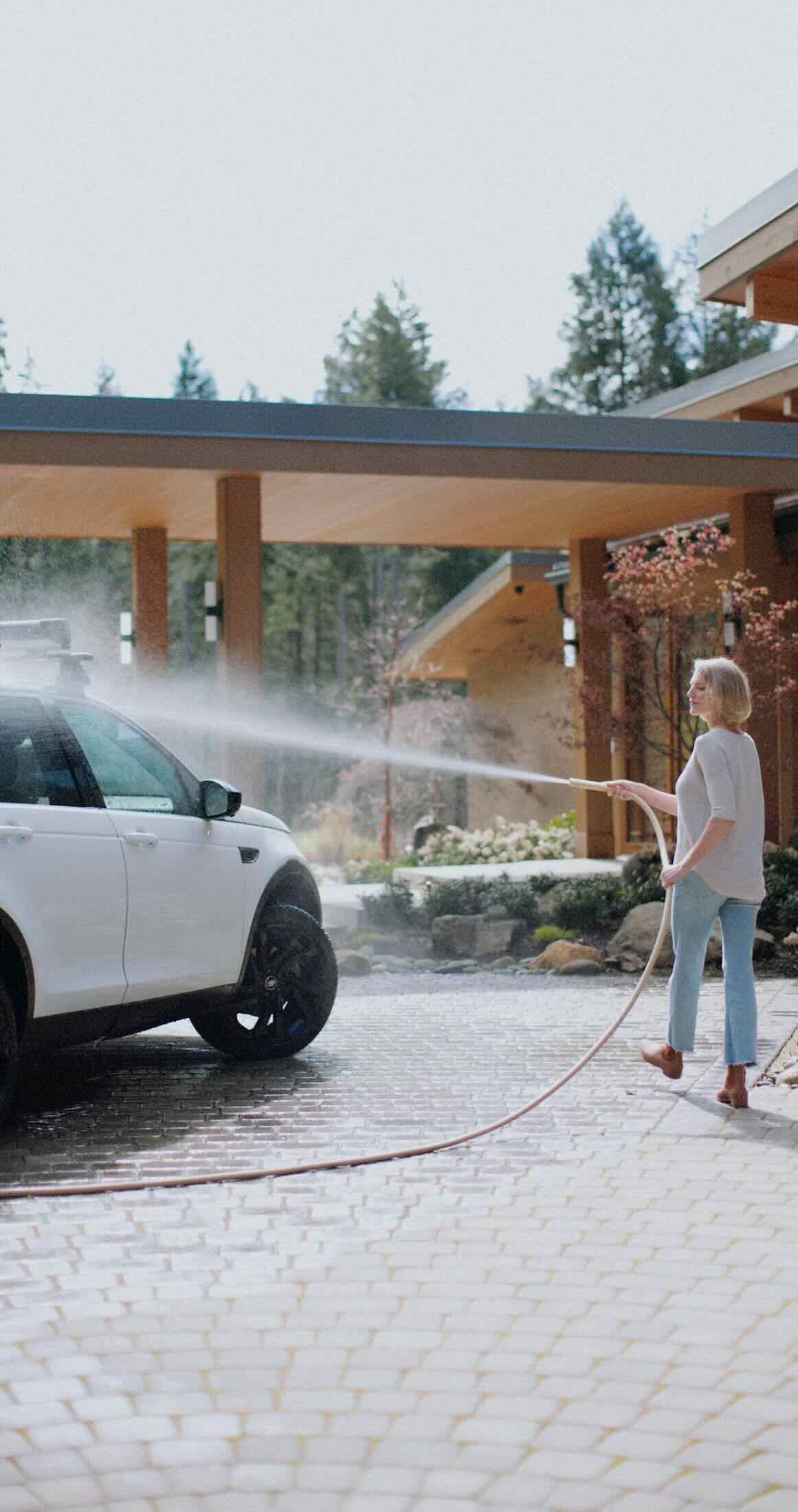 washing car with garden hose