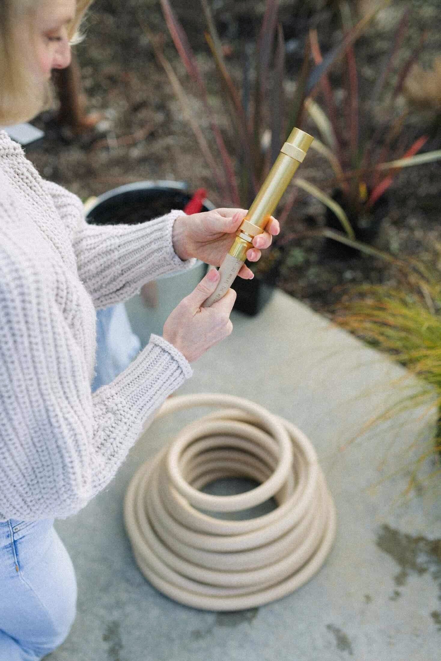 brass nozzle and fittings on garden hose