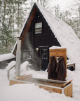 winter wood burning hot tub in the snow