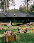 hot tub wood fired with people lounging