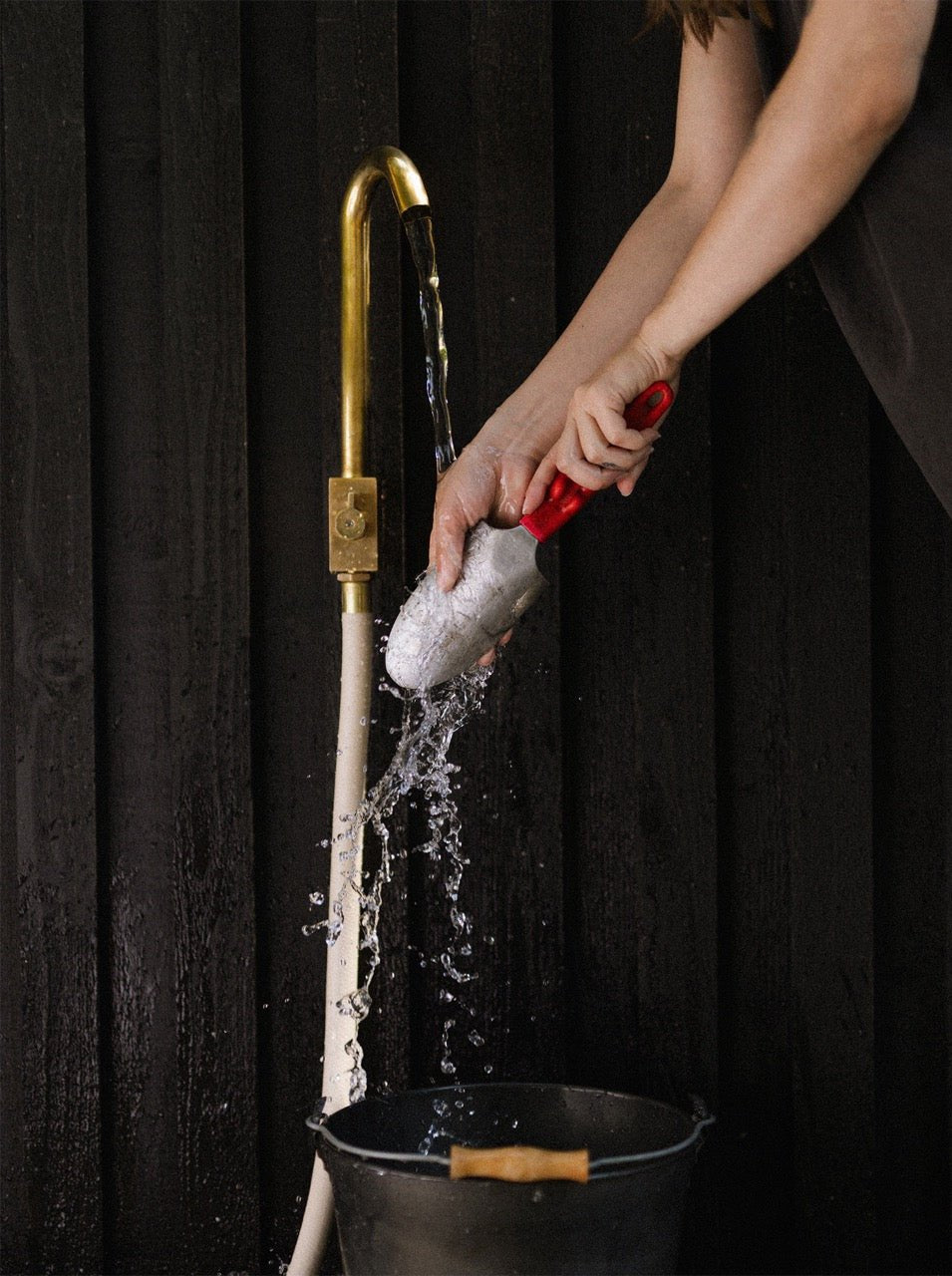 garden hose and brass outdoor faucet