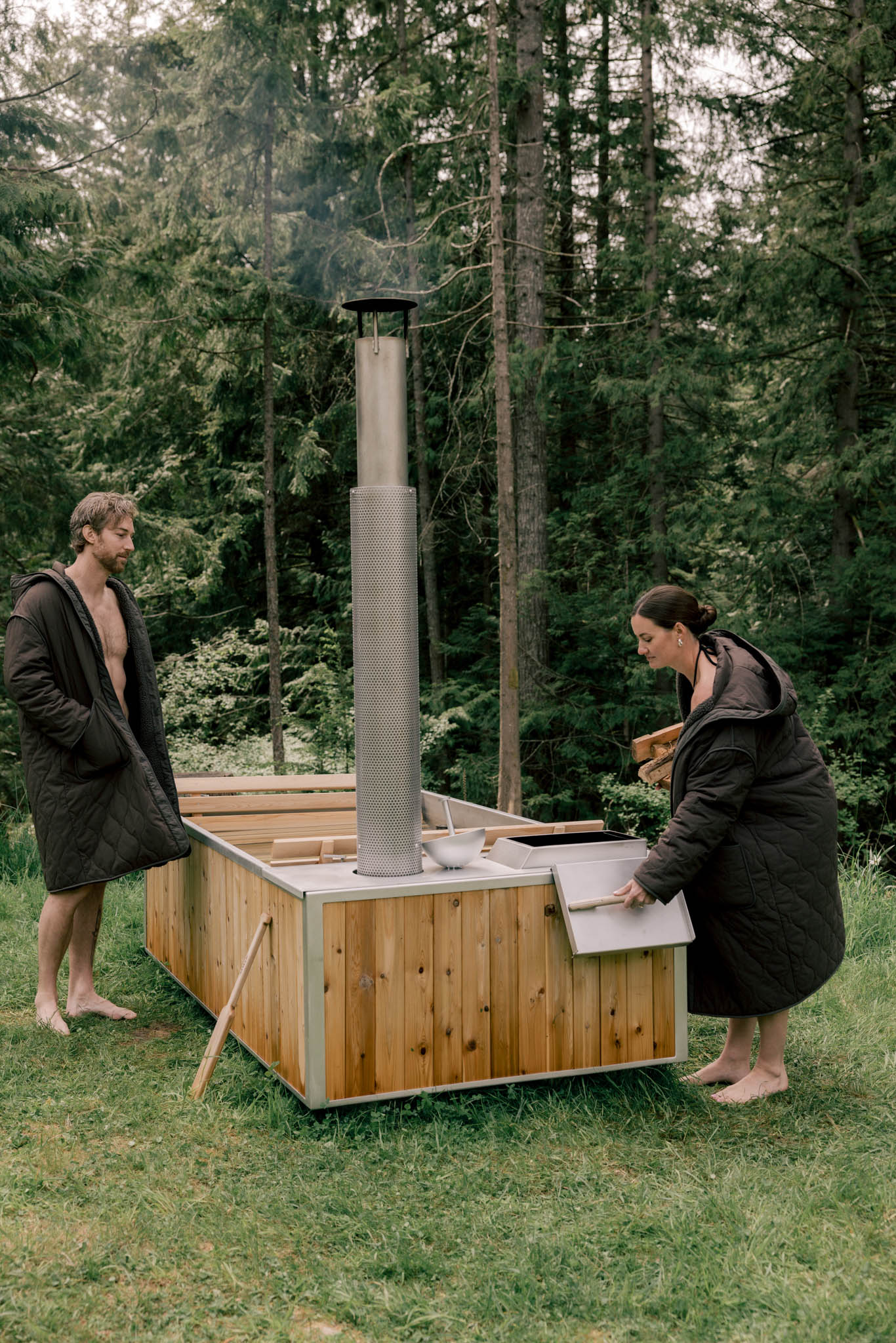 two people wearing swim coats