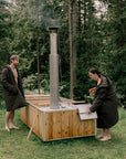 two people wearing swim coats