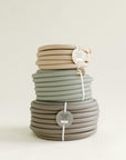 Luxury garden hoses coiled and available in 25, 50, 100 ft hose lengths