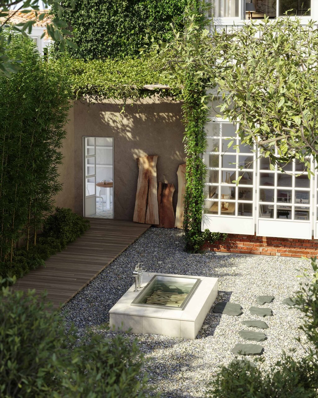 drop in tub surrounded by stone in a courtyard