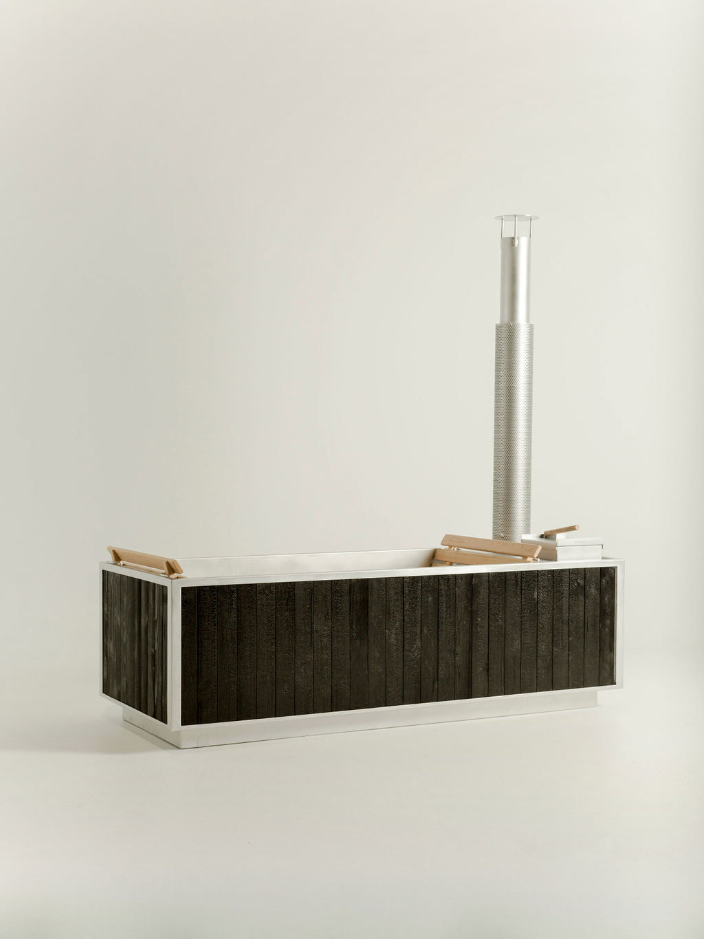 wood burning hot tub in black by GOODLAND
