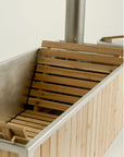 wood burning hot tub with cedar lounging seats 