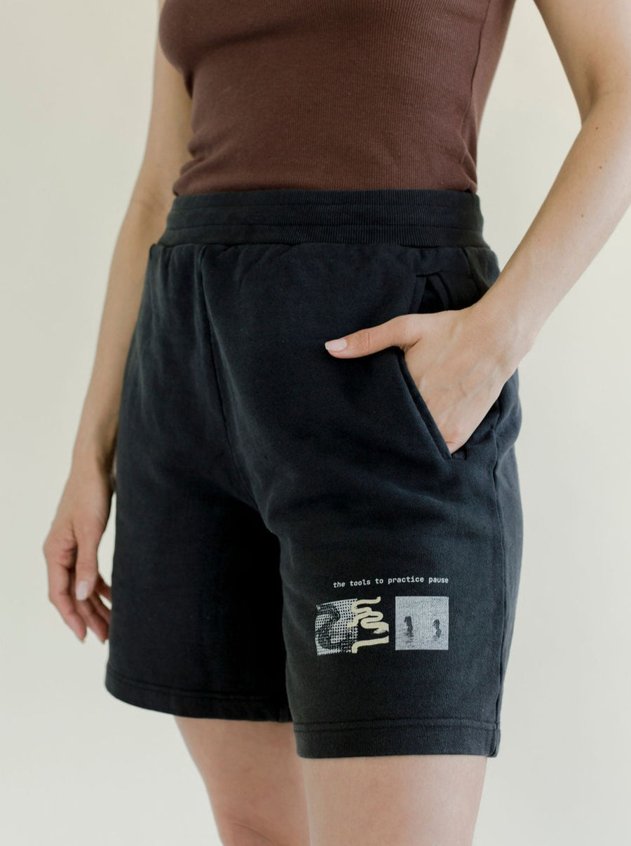 black sweat shorts with graphic