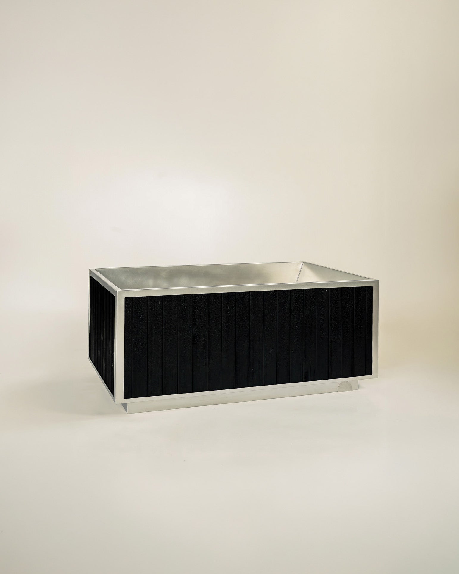 free standing tub made from stainless steel and black wood exterior #color_soot_black