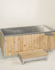 freestanding outdoor tub with platform step and side table 