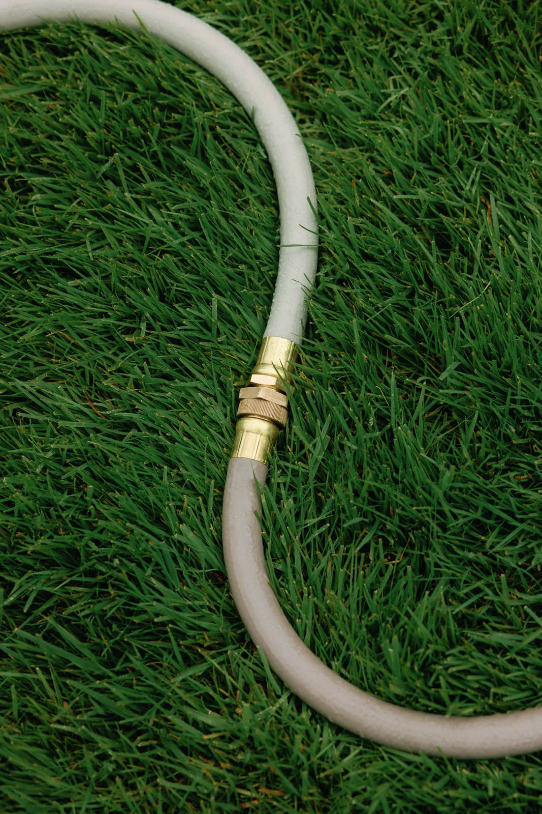 Two Goodland aesthetic garden hoses connected with brass fittings