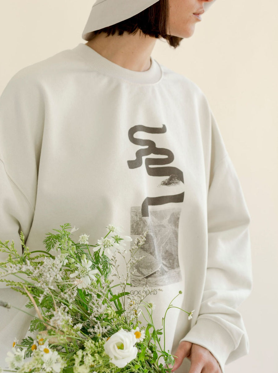 white crewneck with graphic