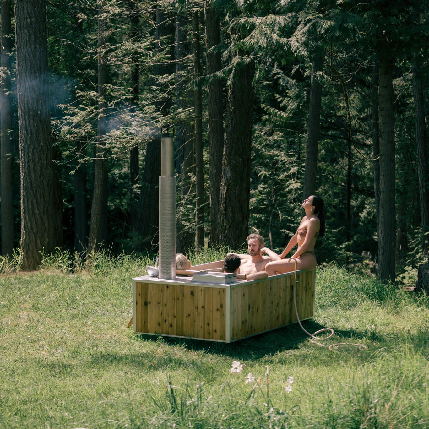4 people in hot tub wood fired