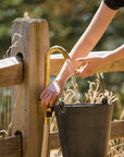 Brass garden faucet as outdoor water source for filling buckets and more