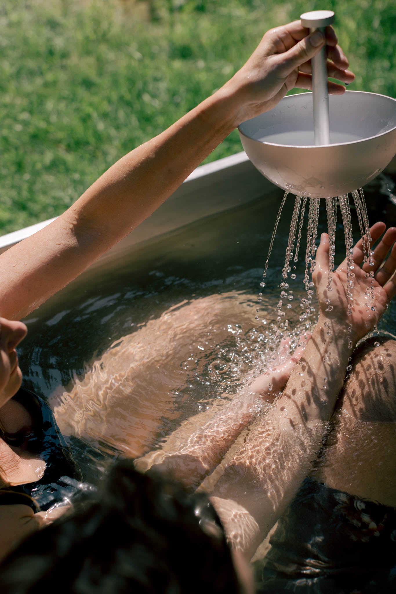 bath ritual with hand shower