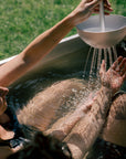 bath ritual with hand shower