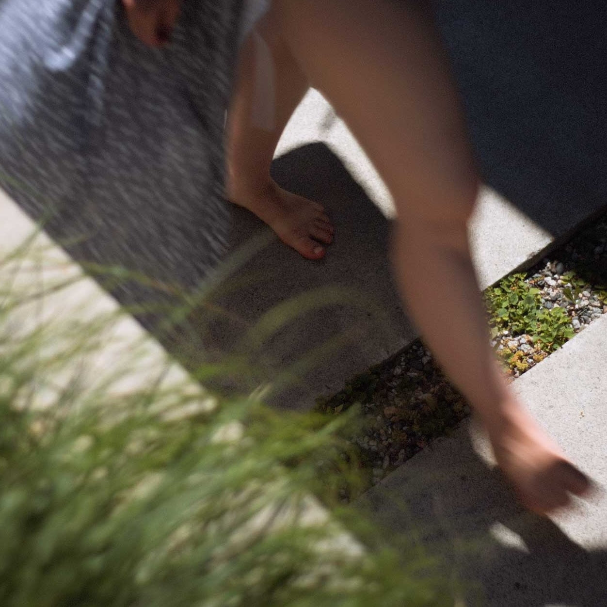 woman walking barefoot in nature