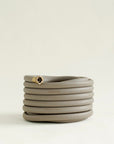 Gray garden hose with brass fittings