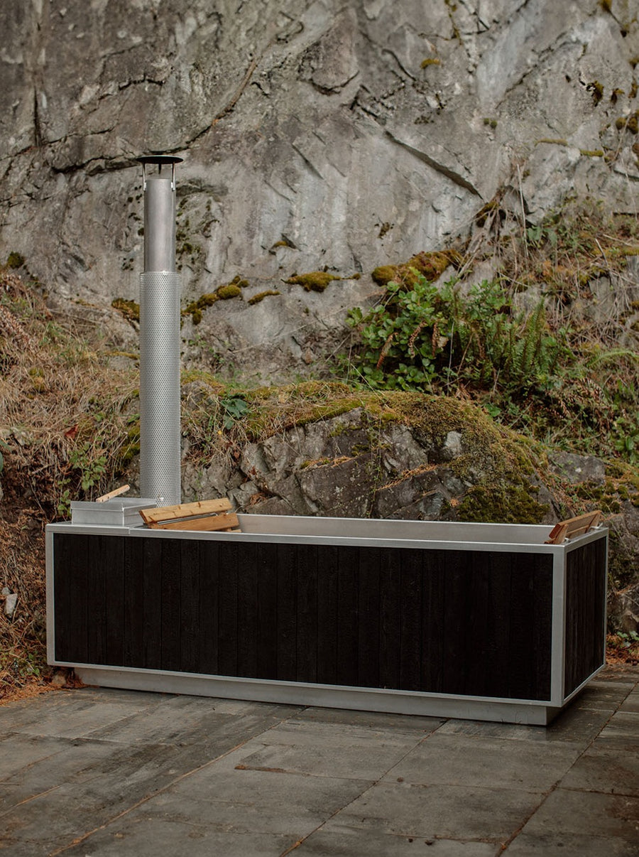 Black Wood Burning Hot Tub Crafted In Canada GOODLAND   Hot Tub Soot Black Lifestyle GL 3 Main 900x 