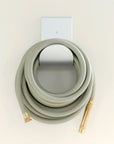 Aluminum modern hose hanger and garden hose 