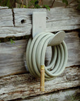 Hose hanger in aluminum with a modern aesthetic design 