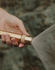 Brass water hose spray nozzle with a wide mist for watering